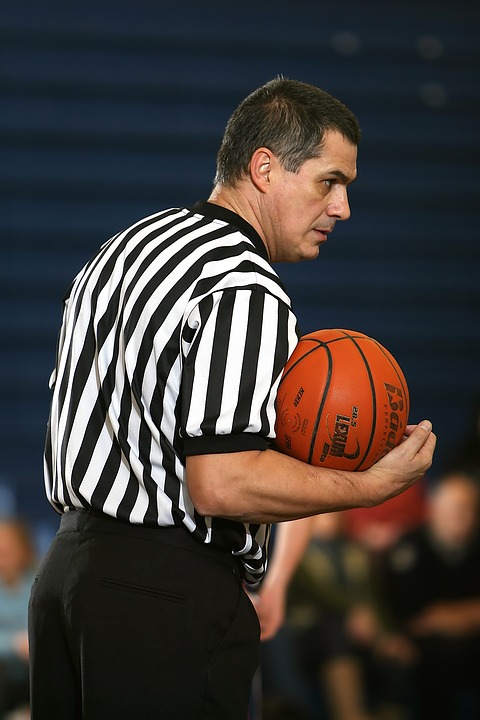 How many referees in basketball game